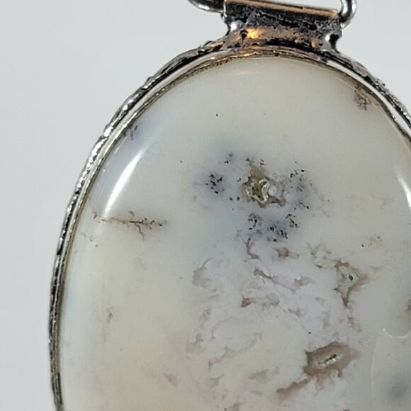 Handmade Silver Pendant With White Dendritic Opal & Floral Bail Detailing - Picture 4 of 10